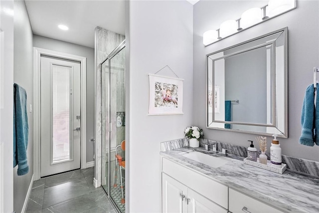 6406 Legacy Pt, Corpus Christi, TX 78414 - bathroom featuring vanity, marble finish floor, baseboards, recessed lighting, and a stall shower