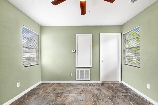 unfurnished bedroom with ceiling fan