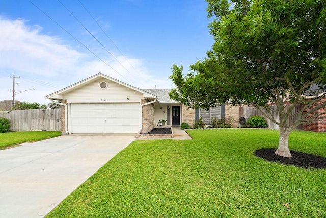 2441 Windsong Dr, Corpus Christi, TX 78414 - view of front of property with a garage, driveway, and brick siding