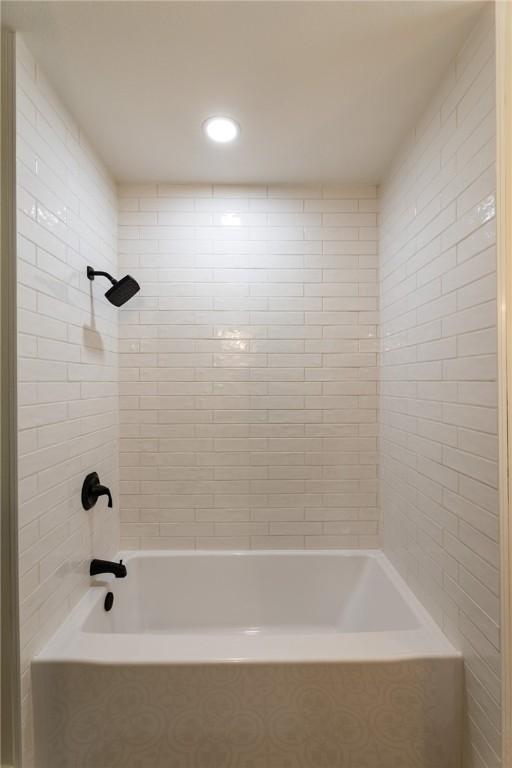full bathroom featuring recessed lighting