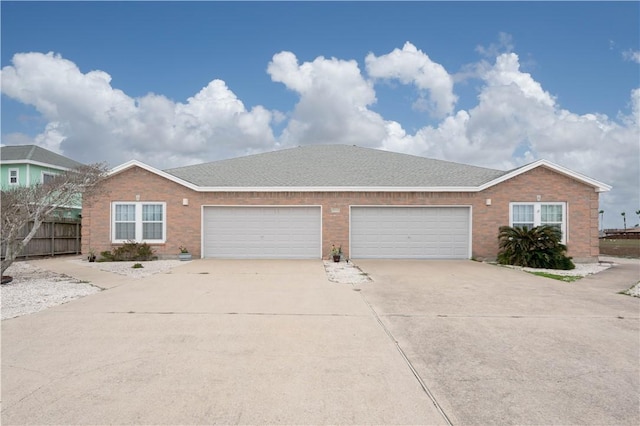 single story home featuring a garage