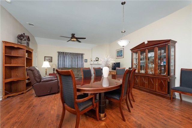 dining room featuring hardwood / wood-style floors and ceiling fan