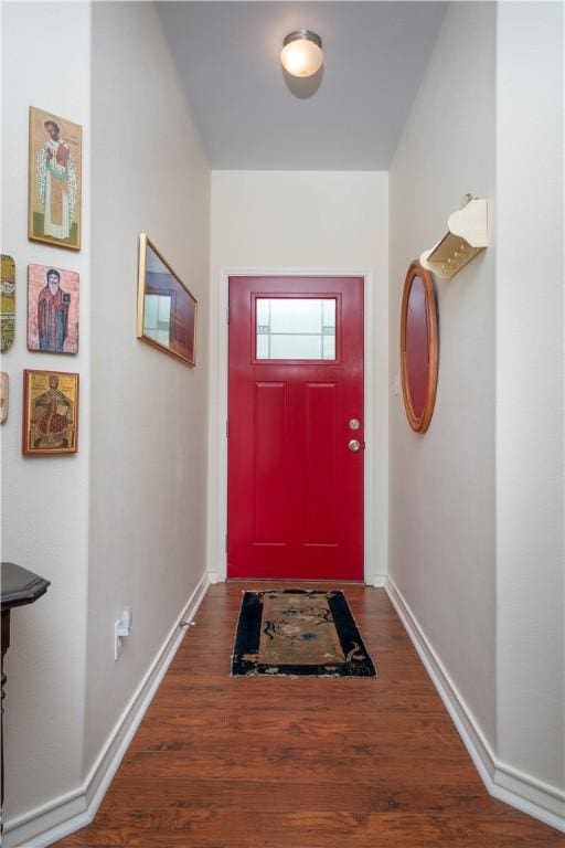 doorway to outside with dark hardwood / wood-style flooring