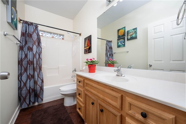 full bathroom featuring vanity, shower / bath combination with curtain, and toilet