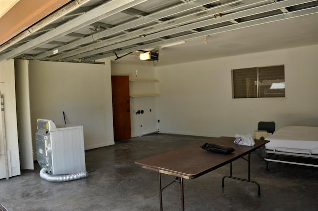 garage featuring a garage door opener