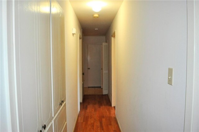hallway featuring wood finished floors