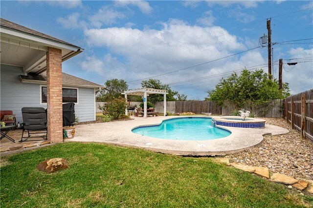 705 Aurora St, Bishop, TX 78343 - view of swimming pool featuring a patio and a pool with connected hot tub