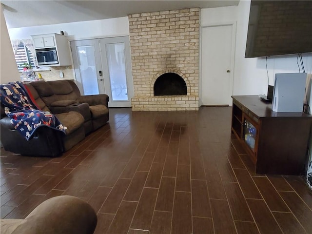 living room featuring a fireplace