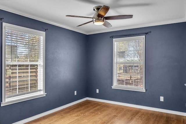 unfurnished room with hardwood / wood-style flooring, ceiling fan, and ornamental molding