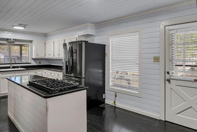 kitchen featuring white cabinetry, a wealth of natural light, and sink