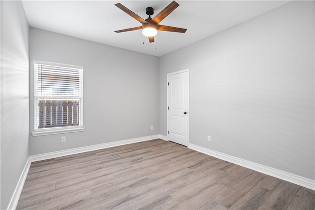 7721 Keiras Way, Corpus Christi, TX 78414 - empty room featuring wood finished floors, a ceiling fan, and baseboards