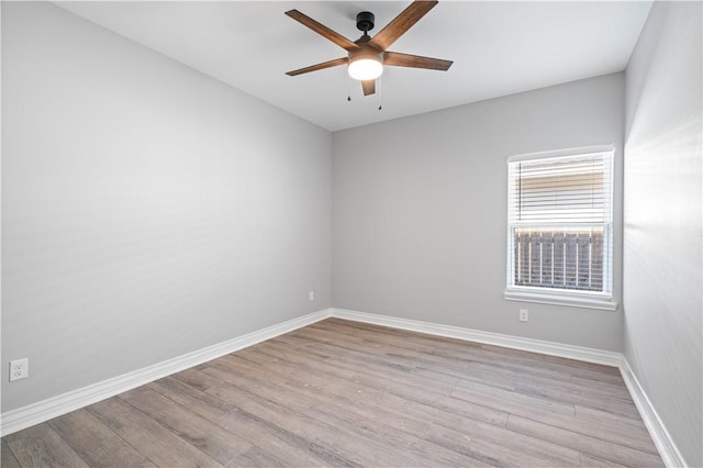7721 Keiras Way, Corpus Christi, TX 78414 - empty room with wood finished floors, a ceiling fan, and baseboards