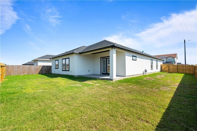 7721 Keiras Way, Corpus Christi, TX 78414 - rear view of house with a patio area