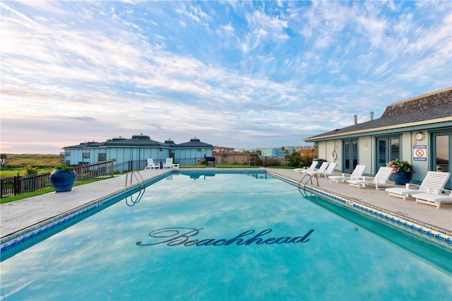 view of swimming pool featuring a patio