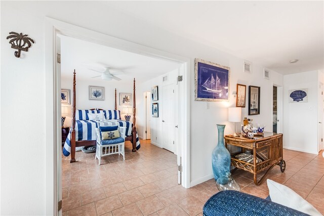 hallway featuring light tile patterned floors