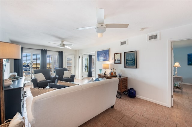 living room featuring ceiling fan