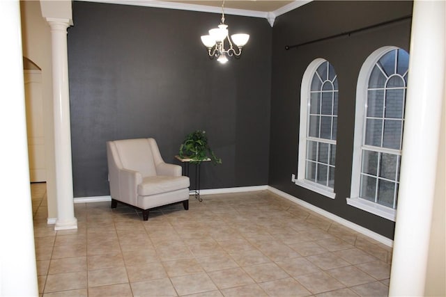 sitting room featuring decorative columns, an inviting chandelier, ornamental molding, and light tile patterned flooring