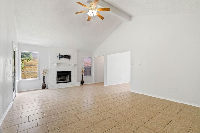 1134 Harbor Village Dr, Corpus Christi, TX 78412 - unfurnished living room featuring beamed ceiling, ceiling fan, a brick fireplace, baseboards, and high vaulted ceiling