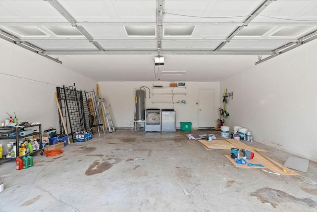 1134 Harbor Village Dr, Corpus Christi, TX 78412 - garage featuring washing machine and clothes dryer, a garage door opener, and water heater