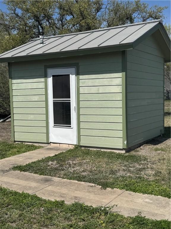 view of outbuilding with an outdoor structure