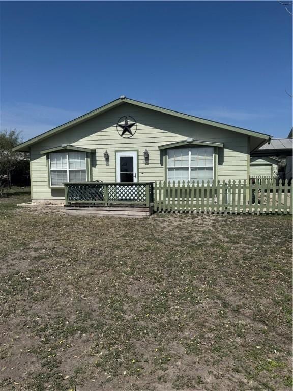 view of front of property with fence