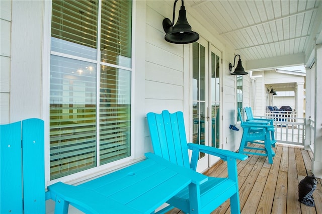 wooden deck with a porch