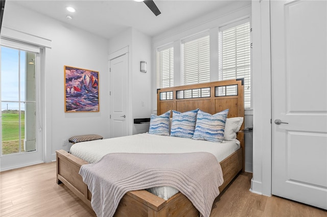 bedroom featuring recessed lighting, ceiling fan, baseboards, and wood finished floors