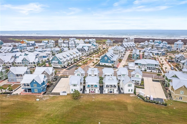 drone / aerial view with a residential view and a water view