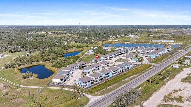 141 Barnacle Dr, Rockport, TX 78382 - drone / aerial view featuring a residential view and a water view