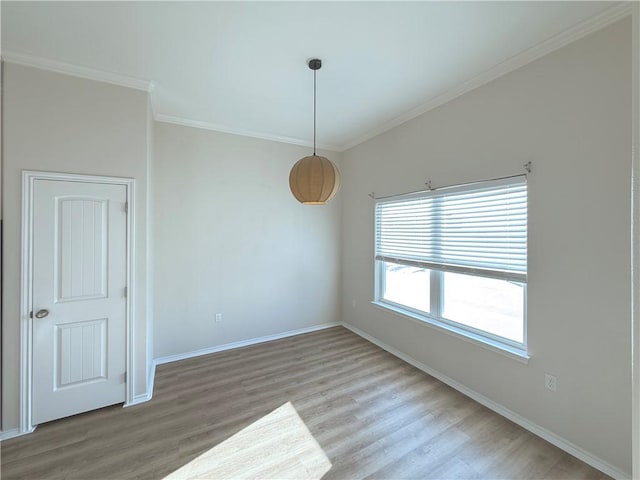 141 Barnacle Dr, Rockport, TX 78382 - unfurnished room with baseboards, wood finished floors, and ornamental molding