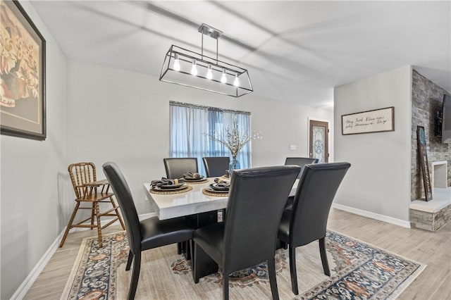 dining room featuring light wood-type flooring