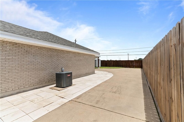 3818 Kingston Dr, Corpus Christi, TX 78415 - fenced backyard with a patio area