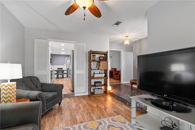 3818 Kingston Dr, Corpus Christi, TX 78415 - living area with a ceiling fan and light wood-style floors