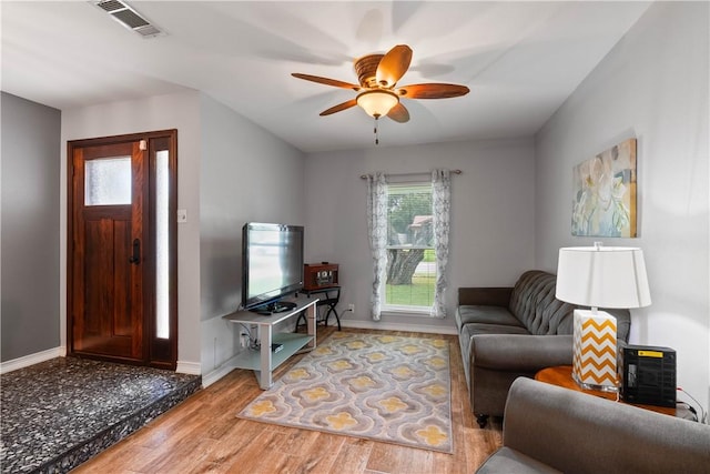 3818 Kingston Dr, Corpus Christi, TX 78415 - living room with wood finished floors and ceiling fan