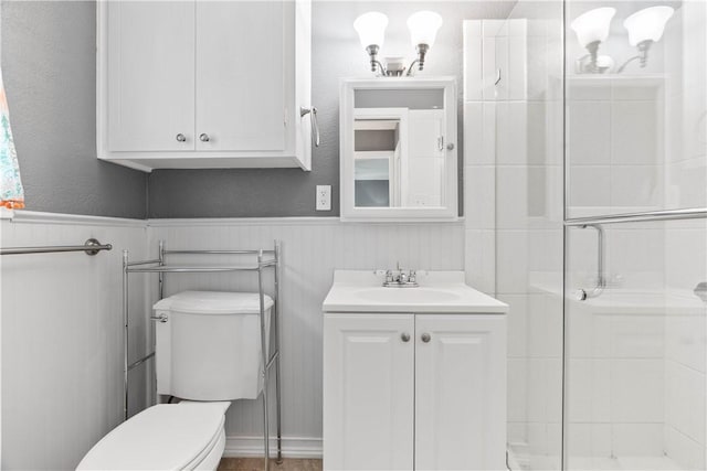 3818 Kingston Dr, Corpus Christi, TX 78415 - full bathroom featuring vanity, a stall shower, a wainscoted wall, and a chandelier