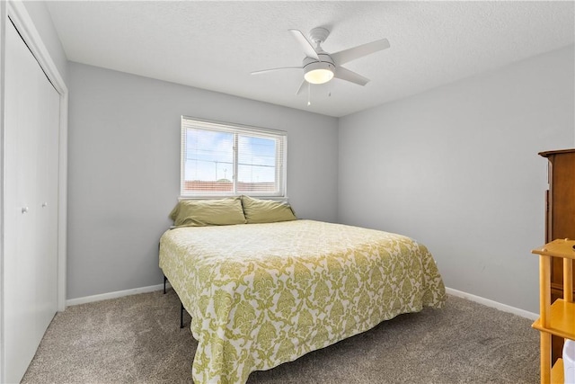 3818 Kingston Dr, Corpus Christi, TX 78415 - bedroom with carpet, a closet, ceiling fan, and a textured ceiling