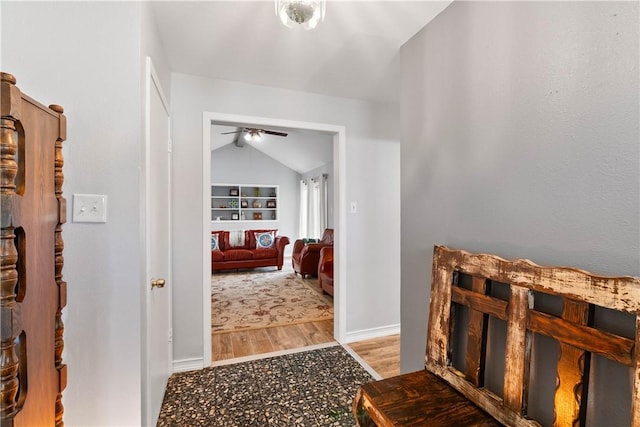 3818 Kingston Dr, Corpus Christi, TX 78415 - hallway featuring vaulted ceiling and wood finished floors