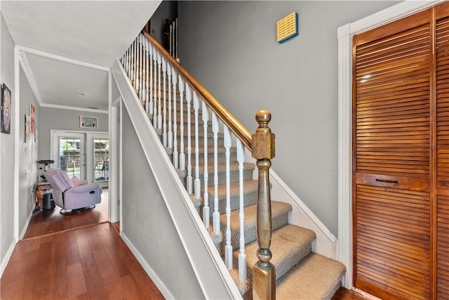7401 Blue Lake Dr, Corpus Christi, TX 78413 - staircase featuring hardwood / wood-style floors and ornamental molding