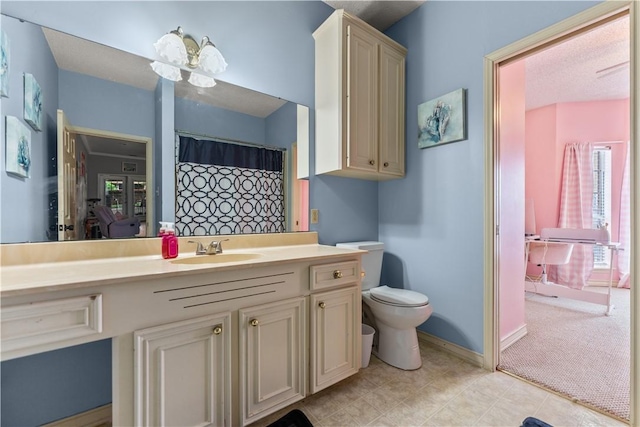 7401 Blue Lake Dr, Corpus Christi, TX 78413 - bathroom with vanity and healthy amount of natural light