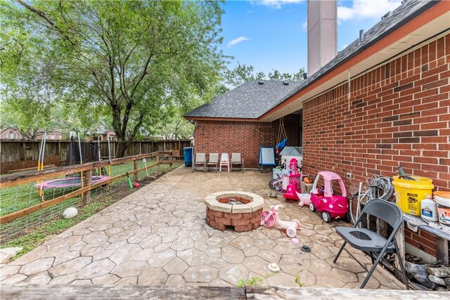 7401 Blue Lake Dr, Corpus Christi, TX 78413 - view of patio / terrace featuring an outdoor fire pit