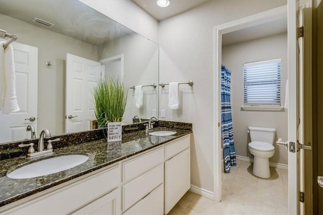 7421 Blue Lake Dr, Corpus Christi, TX 78413 - bathroom with double vanity and tile patterned flooring