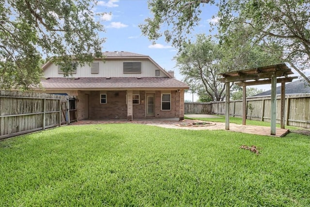 7421 Blue Lake Dr, Corpus Christi, TX 78413 - rear view of house with a patio, a fenced backyard, a shingled roof, and brick siding