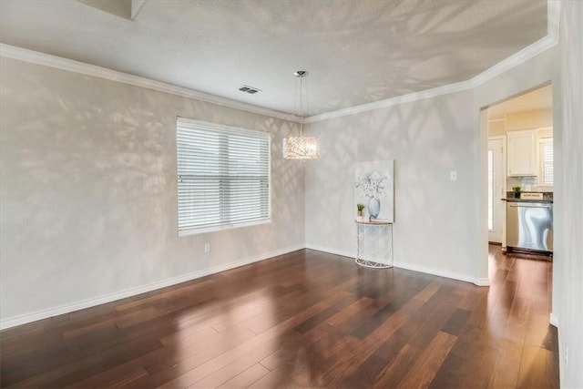 7421 Blue Lake Dr, Corpus Christi, TX 78413 - unfurnished room featuring hardwood / wood-style flooring, a chandelier, and crown molding