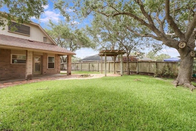 7421 Blue Lake Dr, Corpus Christi, TX 78413 - fenced backyard featuring a patio area