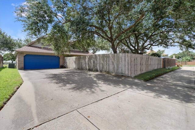 7421 Blue Lake Dr, Corpus Christi, TX 78413 - view of front of home featuring driveway and an attached garage