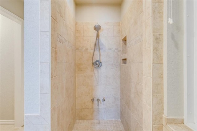 7421 Blue Lake Dr, Corpus Christi, TX 78413 - bathroom featuring a tile shower