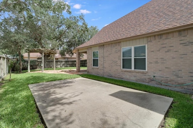 7421 Blue Lake Dr, Corpus Christi, TX 78413 - fenced backyard featuring a pergola and a patio area