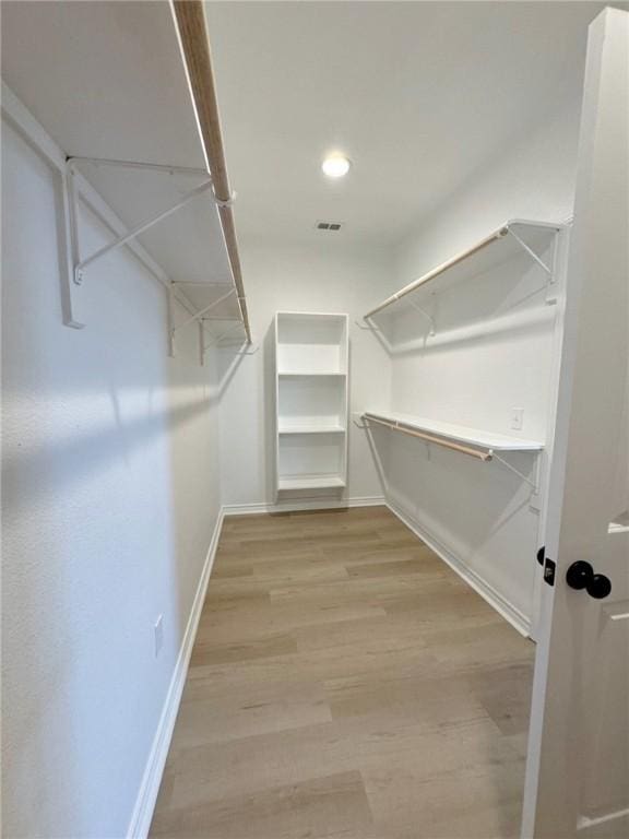 2605 Las Estrellas St, Corpus Christi, TX 78414 - spacious closet with wood finished floors