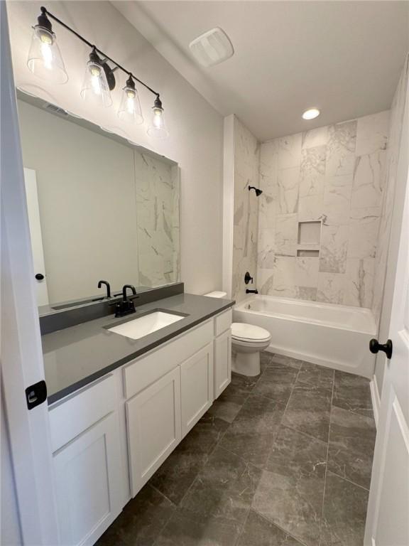2605 Las Estrellas St, Corpus Christi, TX 78414 - full bath featuring vanity, toilet, shower / bathtub combination, and recessed lighting