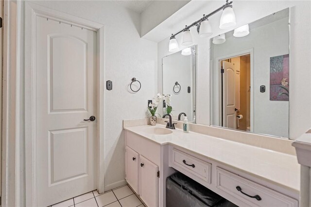 11805 Night Hawk, Corpus Christi, TX 78410 - bathroom with tile patterned floors and vanity